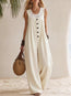 Mono de mujer bohemio con tirantes, botones y detalles de retazos