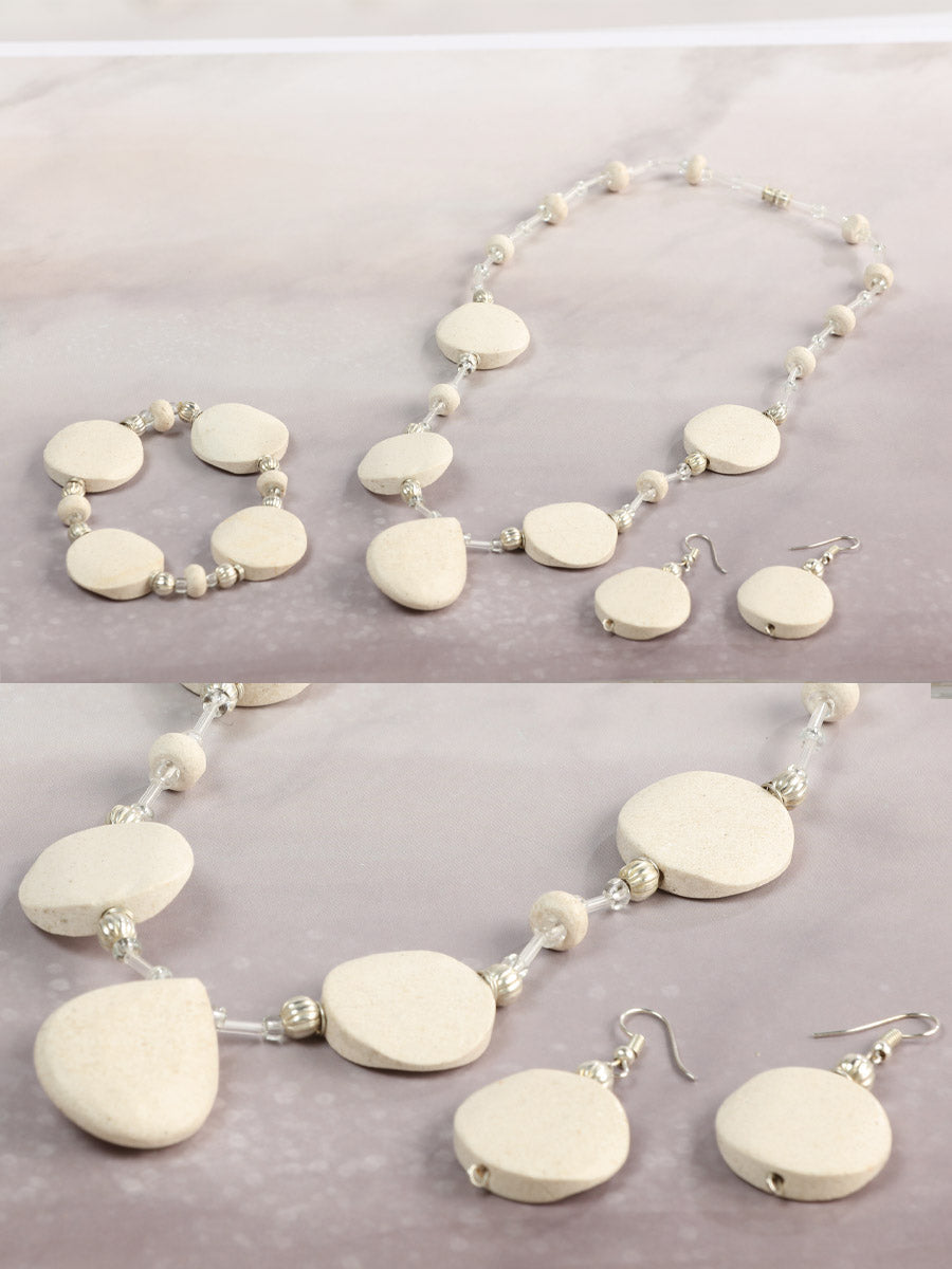 Juego artesanal de pendientes, collar y pulsera de ónix beige 603139