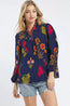 Blusa Umgee con estampado floral y cuello festoneado