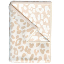 leopardo-bronceado-oscuro-marfil